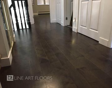 Dark hardwood floor in a modern home interior.
